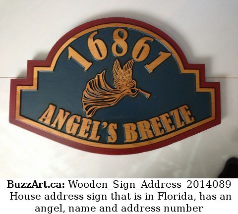 House address sign that is in Florida, has an angel, name and address number